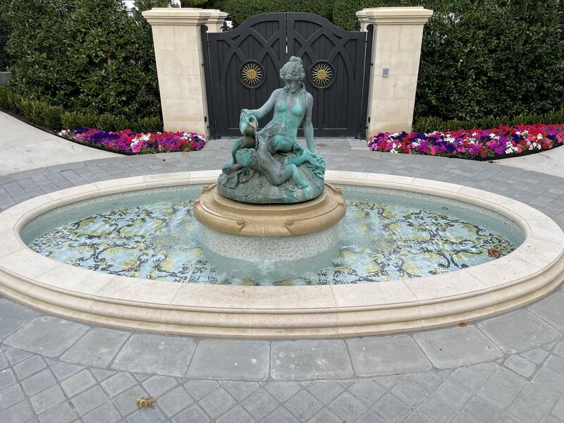 Custom Driveway Water Feature with custom Bisazza gold, black, and white mosaic interior.